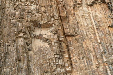 Rock stone texture. The nature of the stone. Close-up photo of a rock