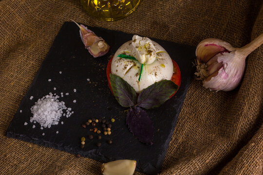 A beautiful composition with burata cheese in a rustic style