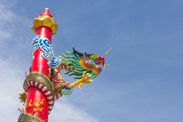 chinese style dragon statue on blue sky background