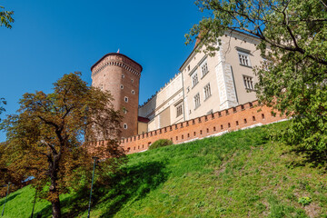 Fototapeta na wymiar Sandomierska Tower, one of the three artillery towers of the Wawel Royal Castle in Krakow, built in about 1460, to strengthen the defenses of the royal residence against attack from the southern side.