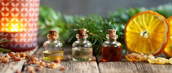 Christmas essential oil with myrrh resin, frankincense, dried orange and fir branches