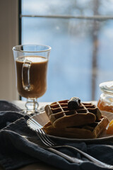 winter good breakfast in the morning Viennese waffles coffee cappuccino