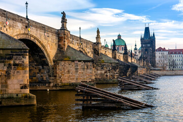 Prague in the morning, Charles Bridge reflected in the Vltava river