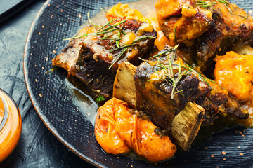 Fried beef ribs in fruit sauce.