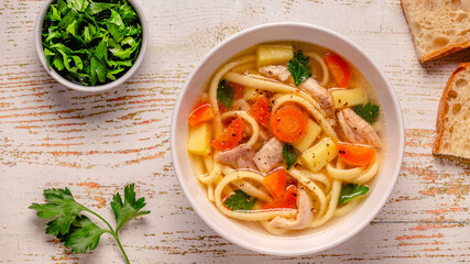 Chicken soup with noodles and vegetables