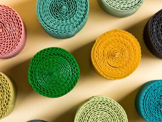 Colored, unusual handmade candles, of natural wax with texture of honeycomb bees, an element of the interior.