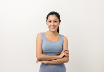 Young beautiful asian woman with sportswear on isolated white background. Portrait sporty woman standing pose exercise workout in studio.