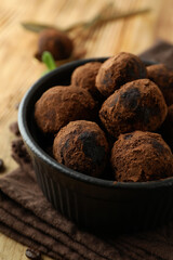 Concept of sweets with truffles on wooden background