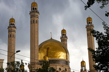 gilded dome and minarets of the mosque 