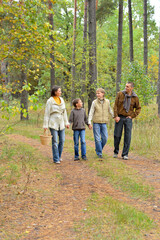 Fototapeta premium Portrait of family of four in park