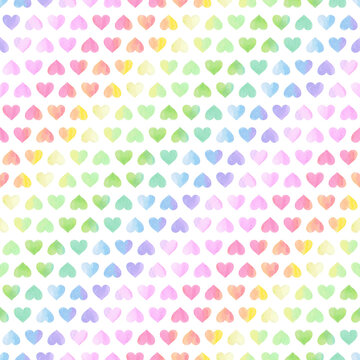 Multicolored watercolor hearts on a white background. Hand drawn seamless pattern, vector illustration.  Texture for fabric, wrapping, wallpaper. Decorative print.