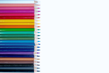 colored pencils on a white background. education, training, presentation concept with copy space