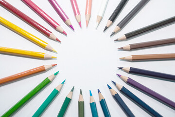 colored pencils on a white background. education, training, presentation concept with copy space