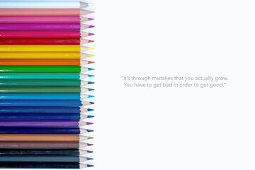 It's through mistakes that you actually can grow. You have to get bad in order to get good on Set of colorful paper clips with white copy space background.