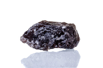 macro mineral stone Obsidian on a white background