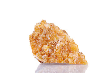 macro mineral stone yellow calcite on a white background