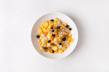 Healthy breakfast, diet culture. Fresh granola, muesli with raisins. Copy space