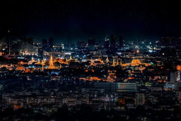 Bangkok cityscape in the middle of the Town, Tele shooting and close up to Wat Arun Ratchawararam Ratchawaramahawihan with Nightscape panorama view.