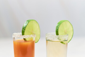 Tequila shot with sangrita and tequila shot. Mexican appetizer for tequila.