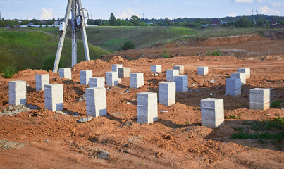 Pile foundation for the construction of a frame country house.