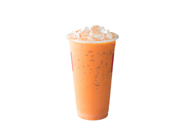Iced orange Thai milk Tea in transparent plastic glass isolated on white background