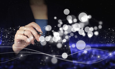 Innovation, big data concept technology. Hand holding digital graphic pen and drawing digital hologram circular diagram sign. Automation Software Technology Process System
