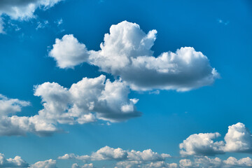 Naklejka na ściany i meble Beautiful blue sky with clouds in background