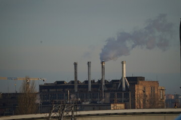 chimney of a factory with a smoke