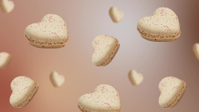 Collection of many different diameters vanilla macaroons in heart shape, flying and wiggle on the natural beige background. Valentine's, Date, Wedding holidays concept. High quality 4k food footage