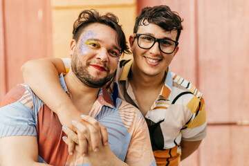 Brazilian Carnival. Happy gay couple having fun during the carnival block