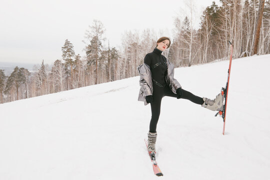 Young girl with skis