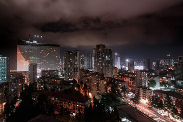 Fototapeta na wymiar Night city panorama. Skyscrapers. Urbanism. Night Batumi.