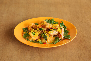 Carnation Butter Prawn with raw onion and garlic isolated wood background top view, Asian seafood