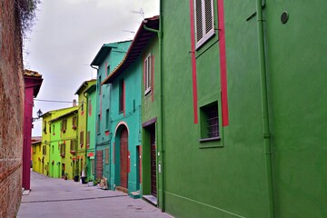 cityscape of Ghizzano, a small colorful village in the municipality of Peccioli in Pisa, Tuscany, Italy