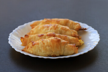 Turkish style potato pie in the form of a roll, made by wrapping dough.