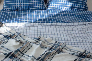background with plaid and bed linen