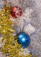 Christmas toys on the Christmas tree balls sequins snowflakes tinsel