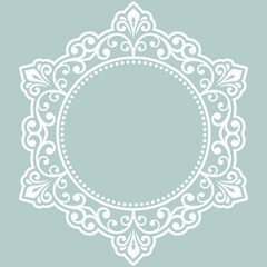 Oriental vector round frame with arabesques and floral elements. Floral light blue and white border with vintage pattern. Greeting card with place for text