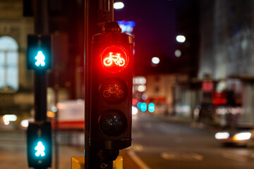 Cycling traffic light on red in the city