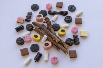 Colorful licorice candies on white background
