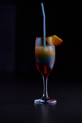 Tasty cocktail with alcohol in low key on a dark background.