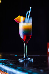 Tasty cocktail with alcohol in low key on a dark background.