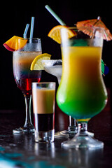 Tasty cocktail with alcohol in low key on a dark background.