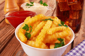 french fries on wooden table