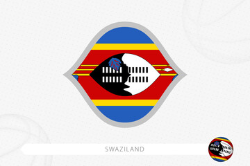 Swaziland flag for basketball competition on gray basketball background.