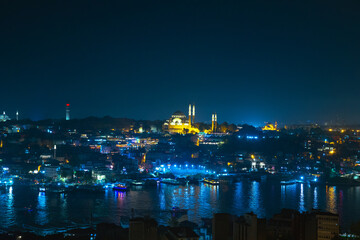 Mosque background photo. Suleymaniye Mosque and cityscape of Istanbul at night