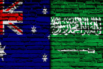 Background with flag of Saudi Arabia and Australia on a brick wall