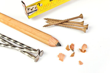 Carpenter's Pencil with Sharpening Shavings, Tape Measure, Framing Nails and Deck Screws