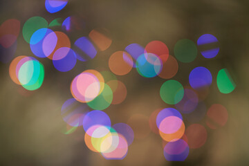 Holiday blurred bokeh background, glitter, light effect, party. Blurred color light abstract background with bokeh defocused lights