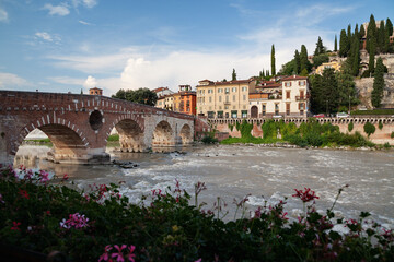 Verona, Italy. Adige river, Ponte Pietra bridge at sunset - 480243652